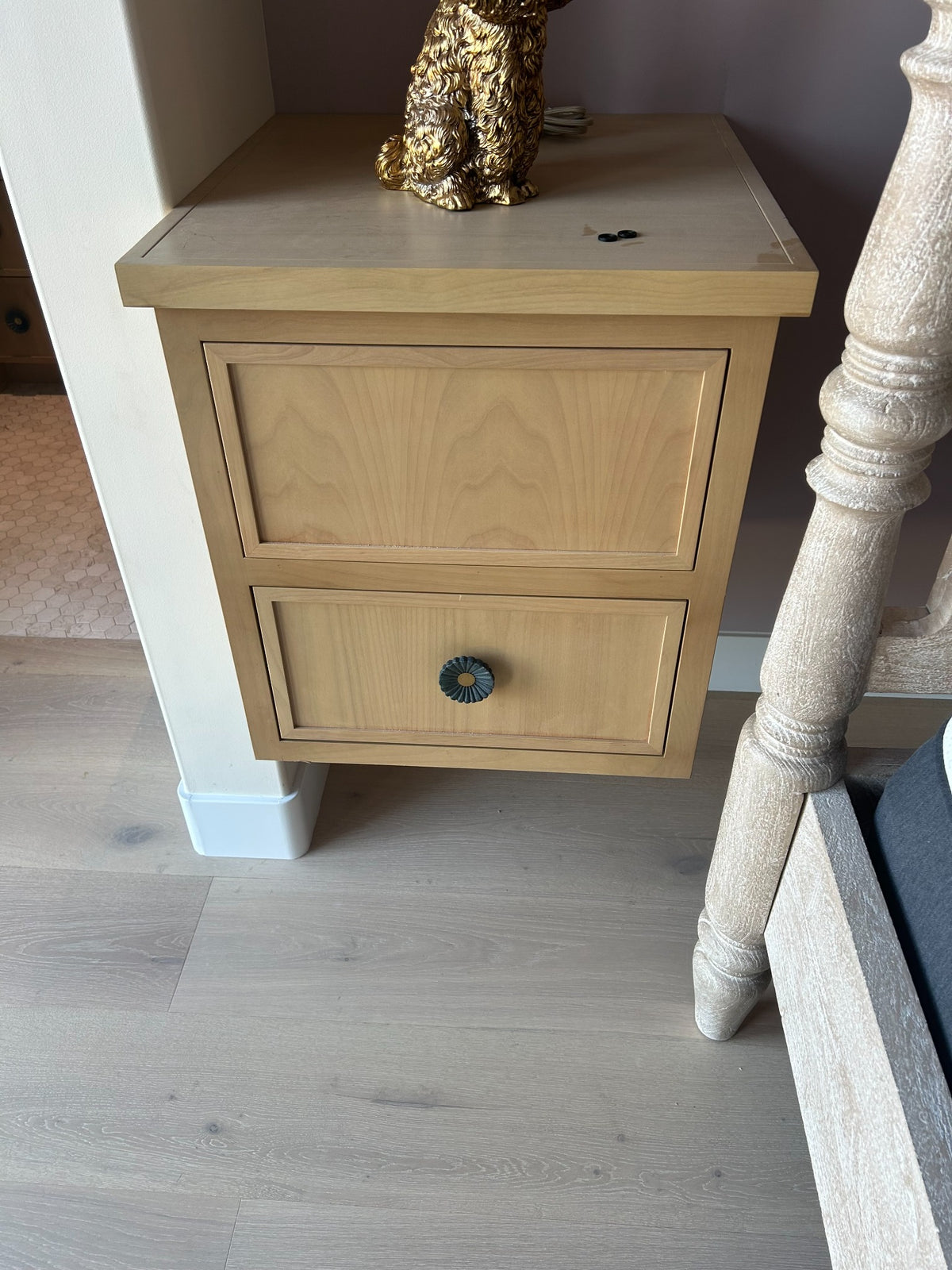 Custom bedside cabinet with inset panel detailing