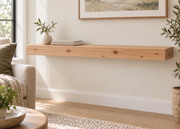 Gentry Stinson Knotty Alder Floating Shelf | 42″ long × 3″ thick | Standard Mount | Unfinished — unlit living-room rendering