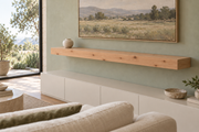 Gentry Stinson Knotty Alder Floating Shelf | 60″ long × 4″ thick | Standard Mount | Unfinished — unlit living-room rendering