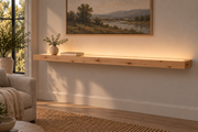 Gentry Stinson Knotty Alder Floating Shelf | 66″ × 10″ × 3″ | Standard Mount | Unfinished | LED Light Ready — Top Front room view; LED tape and electrical components supplied separately