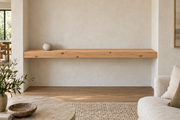 Gentry Stinson Knotty Alder Floating Shelf | 66″ × 8″ × 3″ | Wall to Wall | Unfinished — unlit living-room rendering