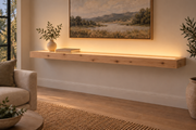 Gentry Stinson Knotty Alder Floating Shelf | 72″ × 10″ × 3″ | Standard Mount | Unfinished | LED Light Ready — Top Front room view; LED tape and electrical components supplied separately