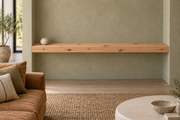 Gentry Stinson Knotty Alder Floating Shelf | 72″ × 10″ × 3″ | Wall to Wall | Unfinished — unlit room view