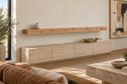 Gentry Stinson Knotty Alder Floating Shelf | 84″ × 8″ × 4″ | Standard Mount | Unfinished — unlit living-room rendering