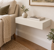 18 x 10 x 3 inch standard painted shelf in Alabaster SW 7008; unlit living-room rendering.