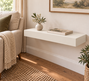 24 x 10 x 3 inch standard-mount floating shelf in Alabaster SW 7008, unlit.