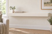 36-inch long, 3-inch thick standard-mount painted floating shelf in Alabaster SW 7008; representative living-room rendering; no lighting.
