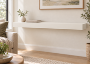 42 x 10 x 3 inch standard painted floating shelf in Alabaster SW 7008, unlit living-room rendering.