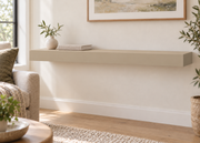 42 x 10 x 3 inch standard painted floating shelf in Universal Khaki SW 6150, unlit living-room rendering.