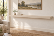 66 x 10 x 3 inch standard painted floating shelf in Natural Linen SW 9109, unlit living-room rendering.
