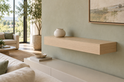 Gentry Stinson Rift White Oak Floating Shelf | 24″ × 10″ × 4″ | Standard Mount | Unfinished — unlit living-room rendering