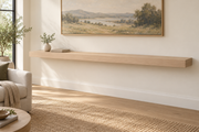 Gentry Stinson Rift White Oak Floating Shelf | 84″ × 10″ × 3″ | Standard Mount | Unfinished — unlit living-room rendering