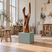 Titan 12 × 16 × 12 inch painted pedestal in Halcyon Green SW 6213, styled with artwork.