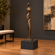 Titan 12 × 16 × 12 inch painted pedestal in Tricorn Black SW 6258, styled with artwork.
