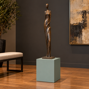 Titan 12 × 16 × 18 inch painted pedestal in Halcyon Green SW 6213, styled with artwork.