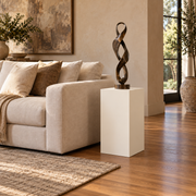 12 × 16 × 24 inch Titan painted pedestal in Alabaster SW 7008 with sculpture in a living setting.