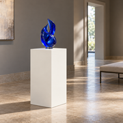 Titan 16 × 16 × 30 inch painted pedestal in Alabaster SW 7008, styled with artwork.