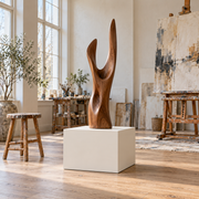 Titan 20 × 20 × 18 inch painted pedestal in Alabaster SW 7008, styled with artwork.