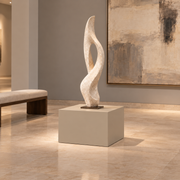 Titan 23 × 23 × 18 inch painted pedestal in Universal Khaki SW 6150, styled with artwork.