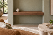 30-inch long, 4-inch thick natural walnut floating shelf, wall-to-wall mount, unlit, living-room rendering