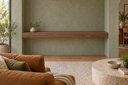 54-inch long, 4-inch thick natural walnut floating shelf, wall-to-wall mount, unlit, living-room rendering