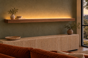 72 × 8 × 3 inch natural walnut floating shelf, standard mount, LED-ready Top Front location shown with separately supplied lighting, living-room rendering