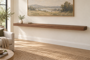 84 × 10 × 3 inch natural walnut floating shelf, standard mount, unlit, living-room rendering