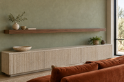 84 × 8 × 3 inch natural walnut floating shelf, standard mount, unlit, living-room rendering