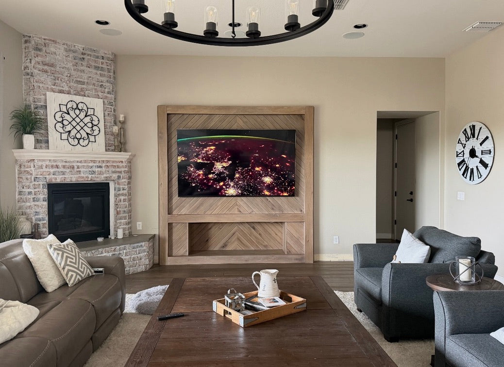 Custom wood media wall with integrated television and storage