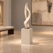 Titan painted display pedestal, 11 × 11 × 18 inches, Natural Linen SW 9109, styled in low-gallery. Artwork not included.
