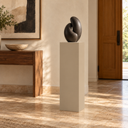 Titan painted display pedestal, 11 × 11 × 36 inches, Universal Khaki SW 6150. Styled setting; artwork not included.