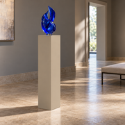 Titan painted display pedestal, 11 × 11 × 42 inches, Universal Khaki SW 6150. Styled setting; artwork not included.