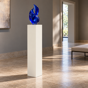 Titan painted display pedestal, 11 × 11 × 42 inches, Alabaster SW 7008. Styled setting; artwork not included.