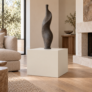 Shoji White SW 7042 painted display pedestal in a 02 low living room broad setting; representative room rendering.