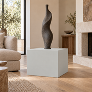 Passive SW 7064 painted display pedestal in a 02 low living room broad setting; representative room rendering.
