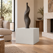 First Star SW 7646 painted display pedestal in a 02 low living room broad setting; representative room rendering.
