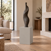 Repose Gray SW 7015 painted display pedestal in a 02 low living room narrow setting; representative room rendering.