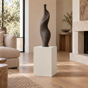 Aesthetic White SW 7035 painted display pedestal in a 02 low living room narrow setting; representative room rendering.