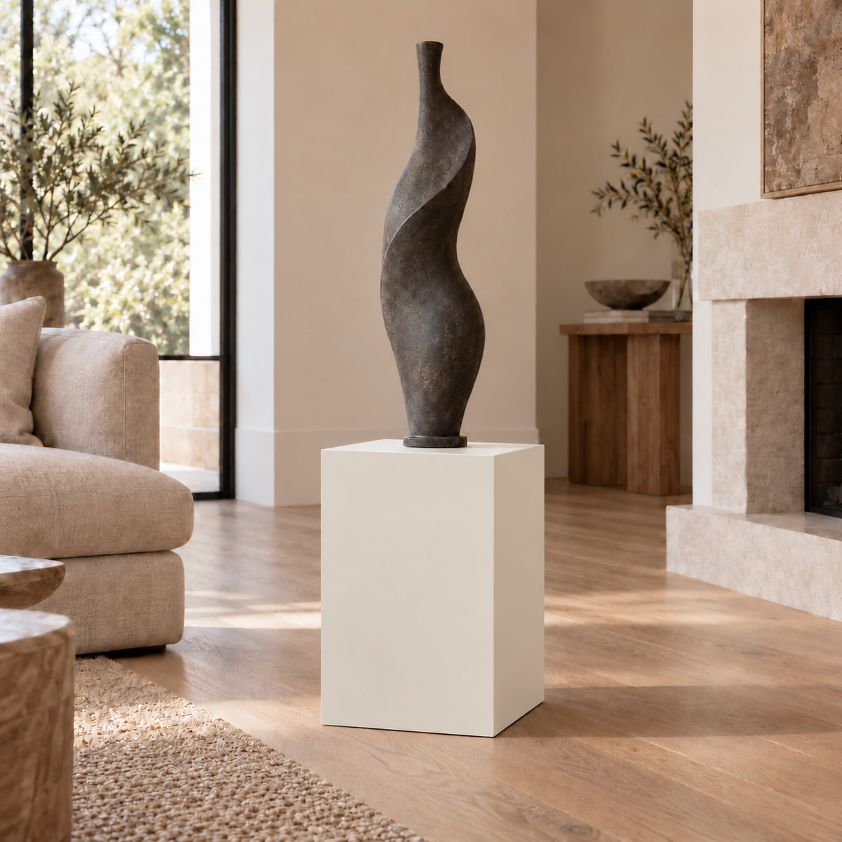 Egret White SW 7570 painted display pedestal in a 02 low living room narrow setting; representative room rendering.