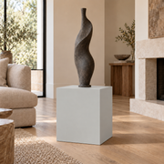 Passive SW 7064 painted display pedestal in a 02 low living room setting; representative room rendering.