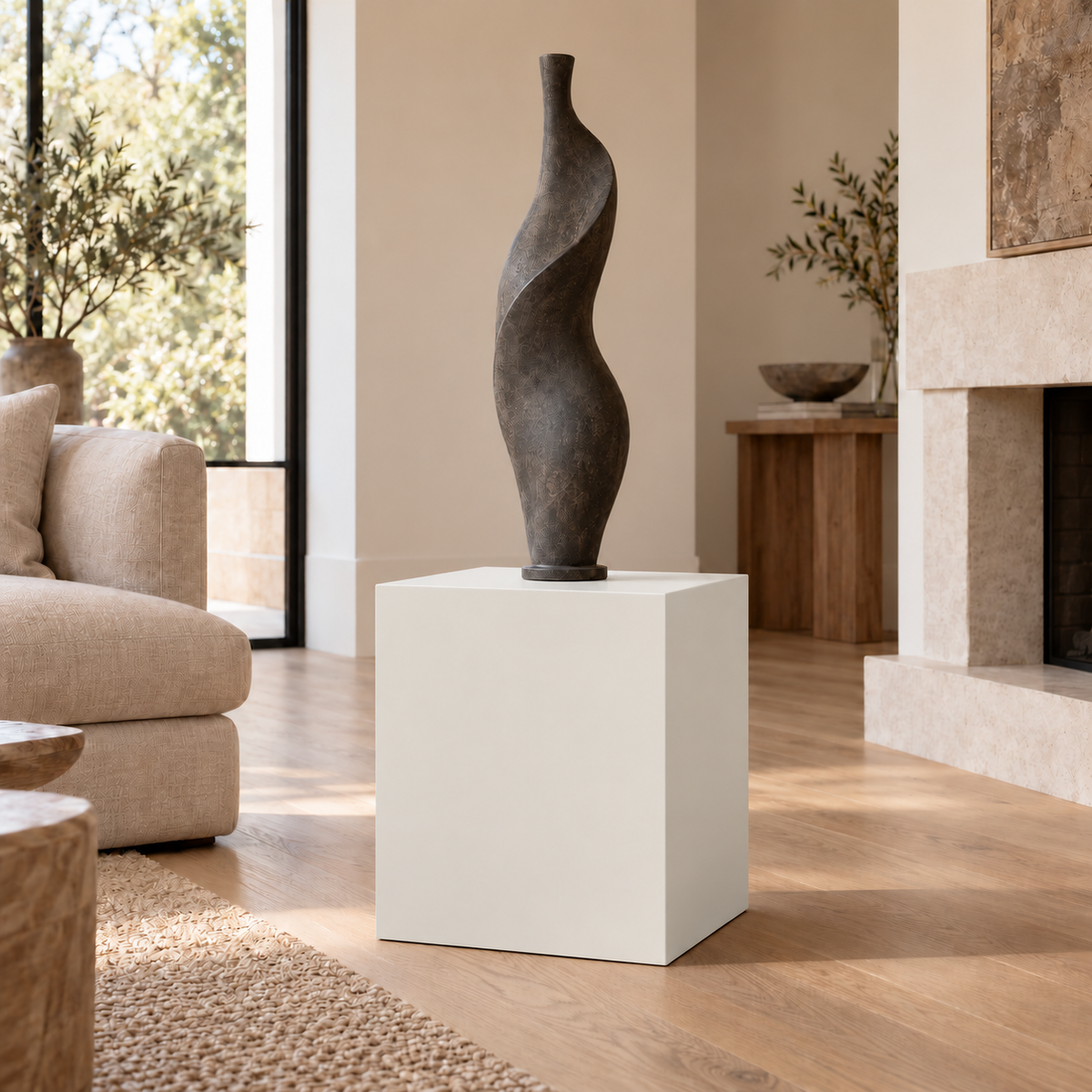 Origami White SW 7636 painted display pedestal in a 02 low living room setting; representative room rendering.