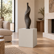 Gossamer Veil SW 9165 painted display pedestal in a 02 low living room setting; representative room rendering.