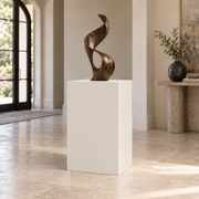 Egret White SW 7570 painted display pedestal in a 03 mid foyer setting; representative room rendering.