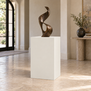 Origami White SW 7636 painted display pedestal in a 03 mid foyer setting; representative room rendering.