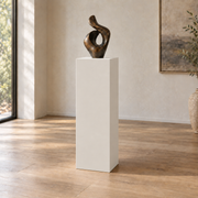 Eider White SW 7014 painted display pedestal in a 04 tall gallery nook slender setting; representative room rendering.