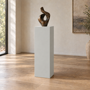 First Star SW 7646 painted display pedestal in a 04 tall gallery nook slender setting; representative room rendering.