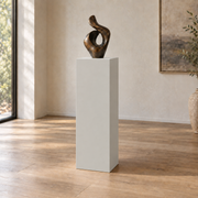 On the Rocks SW 7671 painted display pedestal in a 04 tall gallery nook slender setting; representative room rendering.