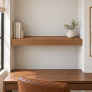 Clear Alder floating shelf in Rubio Monocoat Castle Brown, Wall to Wall mount; unlit representative medium-proportion room rendering, not dimension-specific.