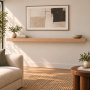 Clear Alder floating shelf in Unfinished / Stain Ready, Standard mount; unlit representative long-proportion room rendering, not dimension-specific.