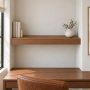 Clear Alder floating shelf in Rubio Monocoat Walnut, Wall to Wall mount; unlit representative medium-proportion room rendering, not dimension-specific.